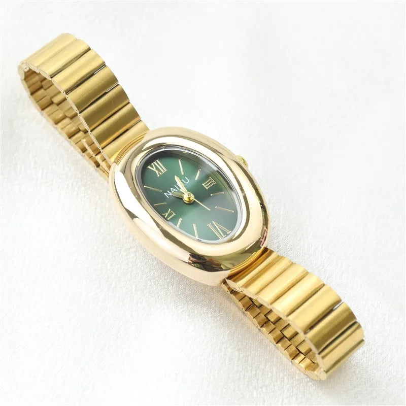 A refined oval dial wrapped in a smooth golden frame, designed to move effortlessly with your everyday moments. Minimal yet expressive, this watch brings quiet luxury to every wrist — perfect for daily wear or thoughtful gifting.