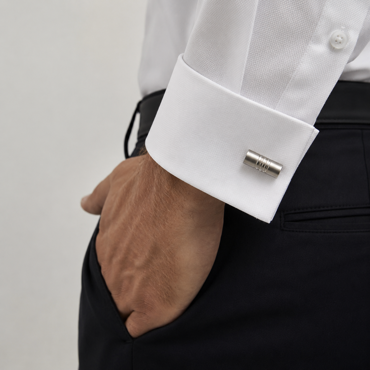 A sleek combination of modern sophistication and timeless formal styling, this matching tie clip and cufflink set is designed to bring a polished finishing touch to every outfit. With its clean metallic structure and minimal industrial detailing, the set delivers a sharp, confident look that feels effortlessly refined.
