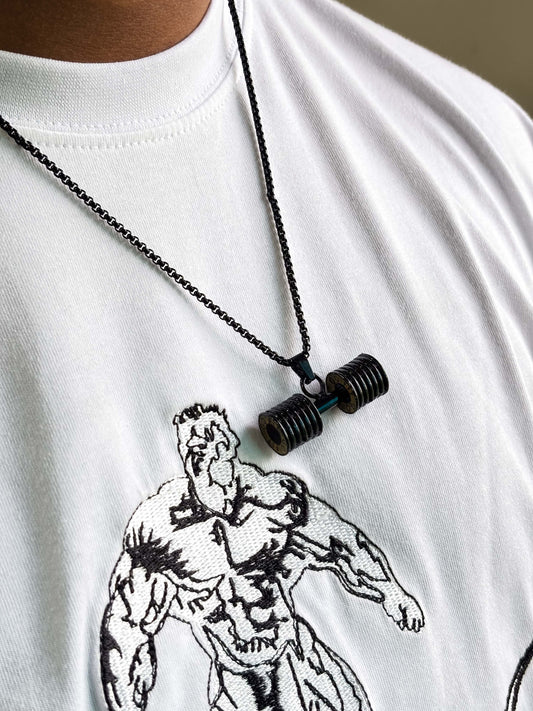 The Alpha Surge T-Shirt — a bold statement for men who move with intensity and purpose. Featuring a powerful chest graphic of a rising muscular figure over a dynamic swoosh, this tee captures the surge of inner strength and style.