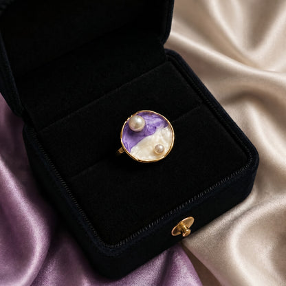 A collection of miniature artworks wrapped into wearable elegance, these rings blend flowing enamel textures, soft pastel tones, pearls, and shell-inspired details into a dreamy statement design. Each variant carries its own oceanic and artistic charm while staying beautifully cohesive as one collection.
