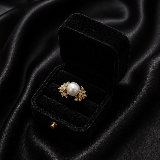 Luxury Artemis Bloom Ring from Loftique BD: High-quality gold-plated copper adjustable ring featuring a large artificial pearl surrounded by golden floral petals embedded with zircon stones. The best gift for her and a perfect for gifting choice for Mother's Day, anniversaries, or birthdays in Bangladesh. Shop this exclusive one-stop gifting solution at the top-rated gift shop in BD, available only at Loftique.