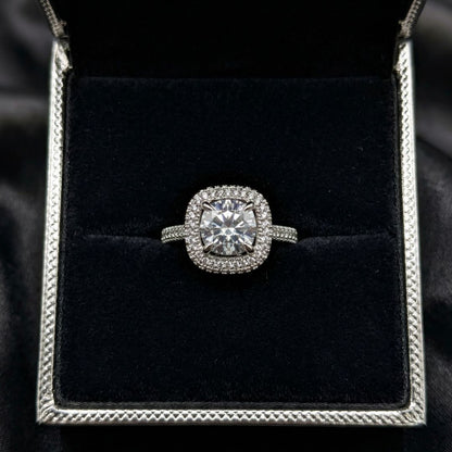The Aurielle Halo Ring is designed to shine with effortless sophistication, featuring a dazzling round-cut zircon centerpiece encircled by a delicate halo of micro stones. Its refined silhouette and luminous sparkle create a luxurious look that feels both classic and captivating. Every detail reflects brilliance, making it a statement piece that elevates any moment.