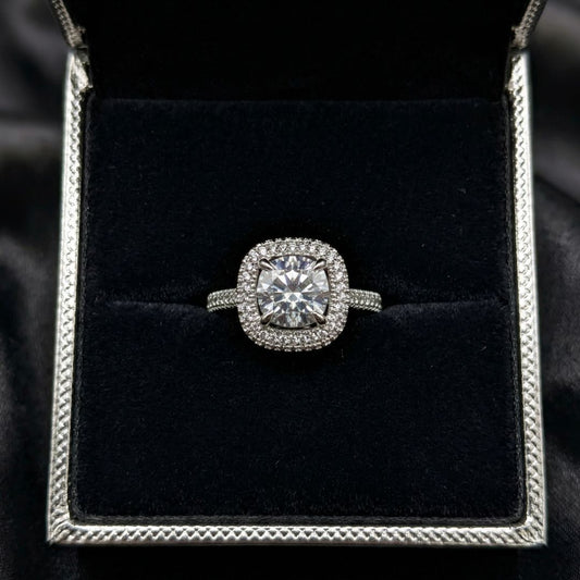 The Aurielle Halo Ring is designed to shine with effortless sophistication, featuring a dazzling round-cut zircon centerpiece encircled by a delicate halo of micro stones. Its refined silhouette and luminous sparkle create a luxurious look that feels both classic and captivating. Every detail reflects brilliance, making it a statement piece that elevates any moment.