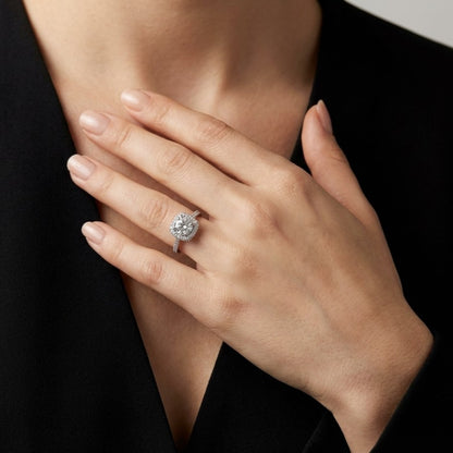 The Aurielle Halo Ring is designed to shine with effortless sophistication, featuring a dazzling round-cut zircon centerpiece encircled by a delicate halo of micro stones. Its refined silhouette and luminous sparkle create a luxurious look that feels both classic and captivating. Every detail reflects brilliance, making it a statement piece that elevates any moment.