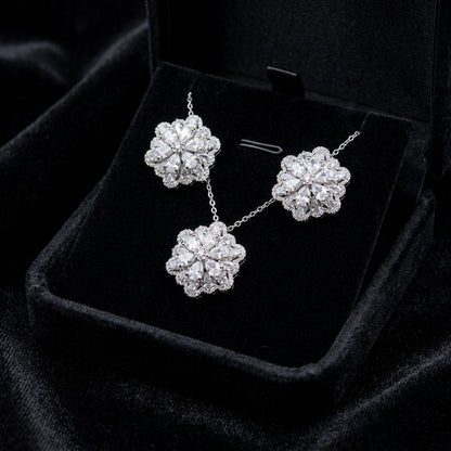 A delicate bloom captured in sparkle, the Blossom Radiance Set brings together floral elegance and luminous charm in a design that feels both graceful and radiant. Each shimmering petal reflects light beautifully, creating a soft glow that enhances your look with effortless femininity. Whether worn for a celebration or as a daily touch of elegance, this floral set adds a graceful sparkle to every moment.