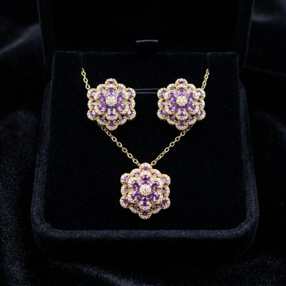 A delicate bloom captured in sparkle, the Blossom Radiance Set brings together floral elegance and luminous charm in a design that feels both graceful and radiant. Each shimmering petal reflects light beautifully, creating a soft glow that enhances your look with effortless femininity. Whether worn for a celebration or as a daily touch of elegance, this floral set adds a graceful sparkle to every moment.