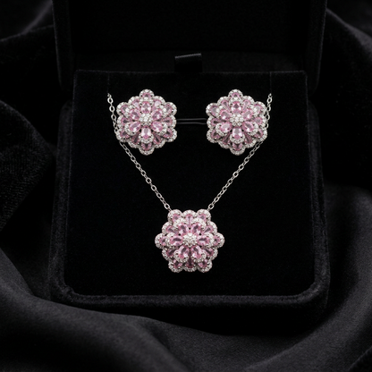 A delicate bloom captured in sparkle, the Blossom Radiance Set brings together floral elegance and luminous charm in a design that feels both graceful and radiant. Each shimmering petal reflects light beautifully, creating a soft glow that enhances your look with effortless femininity. Whether worn for a celebration or as a daily touch of elegance, this floral set adds a graceful sparkle to every moment.