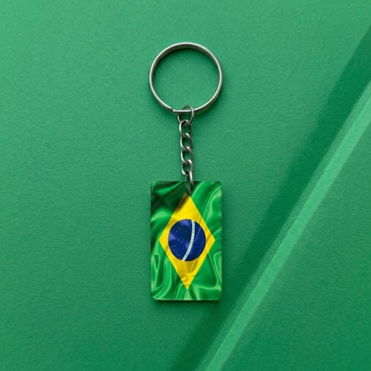 Like a small piece of Brazil’s vibrant football spirit carried everywhere, this stylish keychain captures a bold blend of national pride, sporting passion, and everyday practicality. Featuring the iconic green, yellow, and blue flag design with glossy flowing details, it creates a striking accessory that feels energetic, meaningful, and effortlessly stylish.