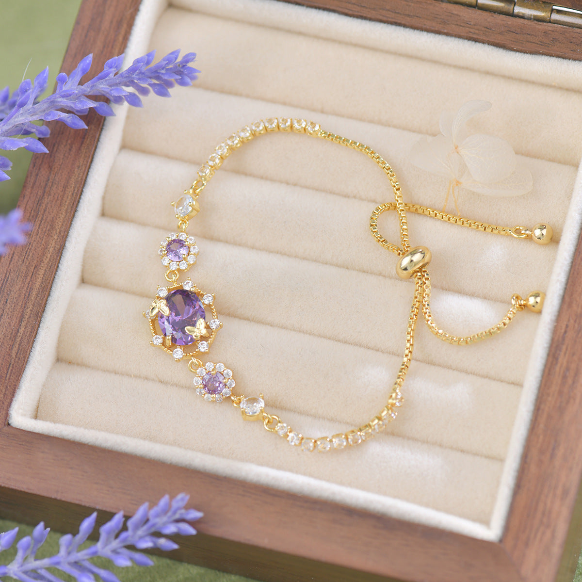 The Butterfly Garden Bracelet is a masterpiece of accessible luxury, featuring an exquisite oval-cut zircon center that radiates a high-end niche appeal. Available in enchanting Sage and Lilac variants, this pull-out bracelet offers a refined fashion statement that brings the delicate beauty of a blooming garden directly to your wrist.