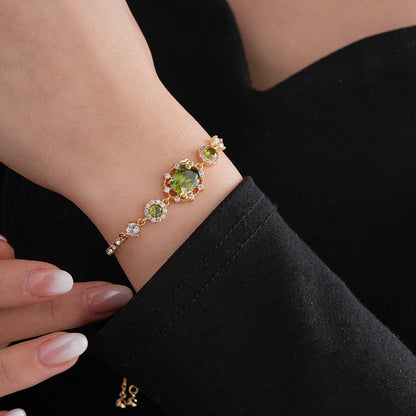 The Butterfly Garden Bracelet is a masterpiece of accessible luxury, featuring an exquisite oval-cut zircon center that radiates a high-end niche appeal. Available in enchanting Sage and Lilac variants, this pull-out bracelet offers a refined fashion statement that brings the delicate beauty of a blooming garden directly to your wrist.