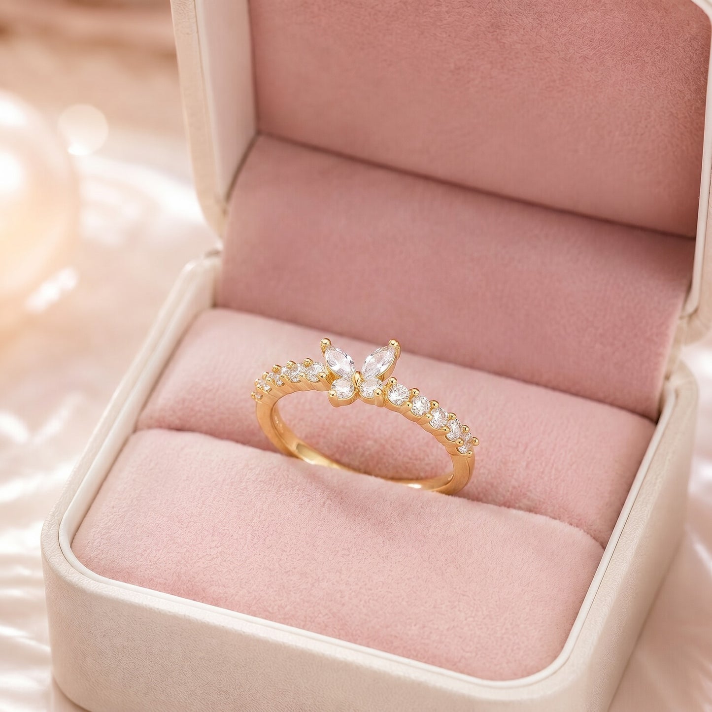 Like a radiant butterfly resting beneath the morning light, this elegant ring captures a graceful blend of freedom, sparkle, and feminine beauty. Featuring a delicate crystal butterfly rising above a shimmering stone-lined band, it creates a refined statement that feels enchanting, graceful, and effortlessly luxurious