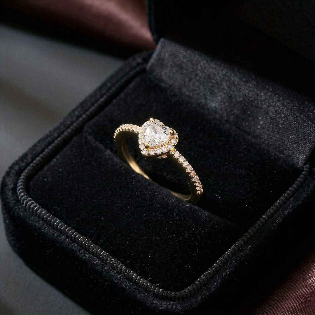 The Celestia Love Ring captures the beauty of love in its most delicate form a shimmering heart adorned with brilliant zircon stones. Designed in both golden and silver variants, this ring blends timeless elegance with a soft romantic glow. Available exclusively at Loftique your One Stop Gifting Solution and Gift Shop BD, where every piece tells a story. 