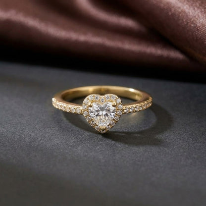 Celestia Love Ring captures the beauty of love in its most delicate form a shimmering heart adorned with brilliant zircon stones. Designed in both golden and silver variants, this ring blends timeless elegance with a soft romantic glow. Its refined band and luminous centerpiece create a graceful balance, making it a piece that feels effortlessly beautiful for every moment.