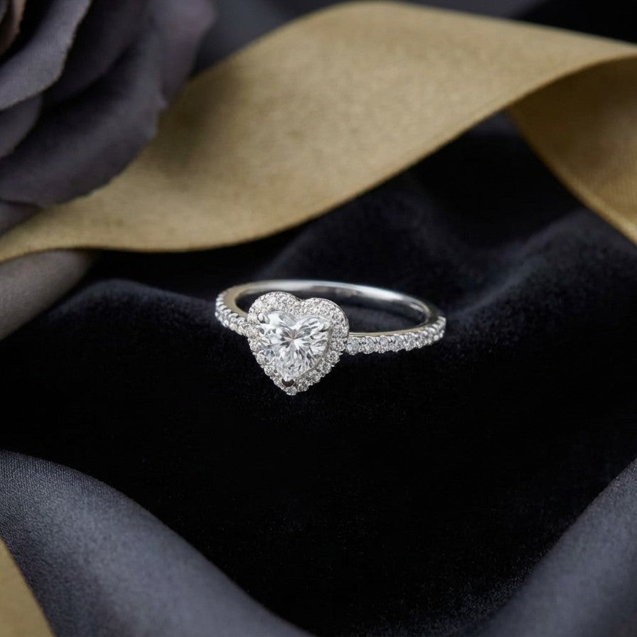 Celestia Love Ring captures the beauty of love in its most delicate form a shimmering heart adorned with brilliant zircon stones. Designed in both golden and silver variants, this ring blends timeless elegance with a soft romantic glow. Its refined band and luminous centerpiece create a graceful balance, making it a piece that feels effortlessly beautiful for every moment.