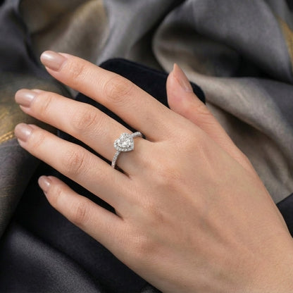 Celestia Love Ring captures the beauty of love in its most delicate form a shimmering heart adorned with brilliant zircon stones. Designed in both golden and silver variants, this ring blends timeless elegance with a soft romantic glow. Its refined band and luminous centerpiece create a graceful balance, making it a piece that feels effortlessly beautiful for every moment