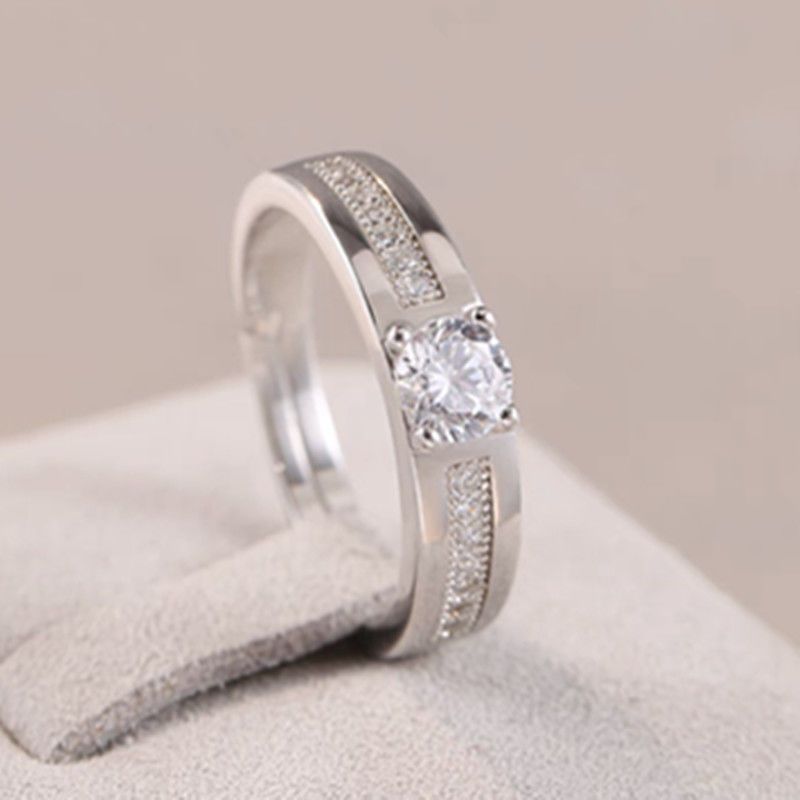 A radiant duo designed to symbolize love and commitment Celestial Promise Rings capture the sparkle of timeless romance. The brilliant center stone surrounded by delicate crystal accents creates a graceful design that feels both elegant and meaningful.