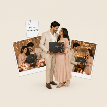 Couple holding a chocolate box with 'Happy Anniversary' cards in the background