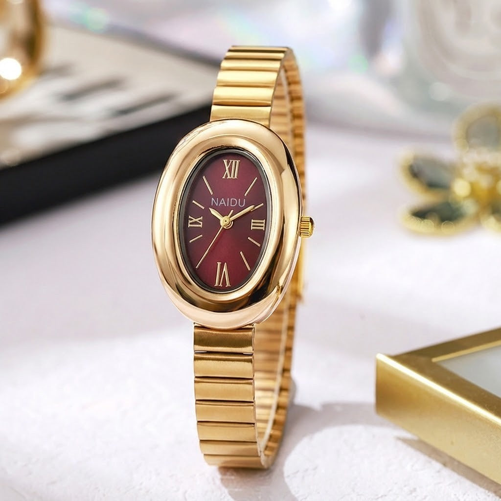 A refined oval dial wrapped in a smooth golden frame, designed to move effortlessly with your everyday moments. Minimal yet expressive, this watch brings quiet luxury to every wrist, perfect for daily wear or thoughtful gifting.