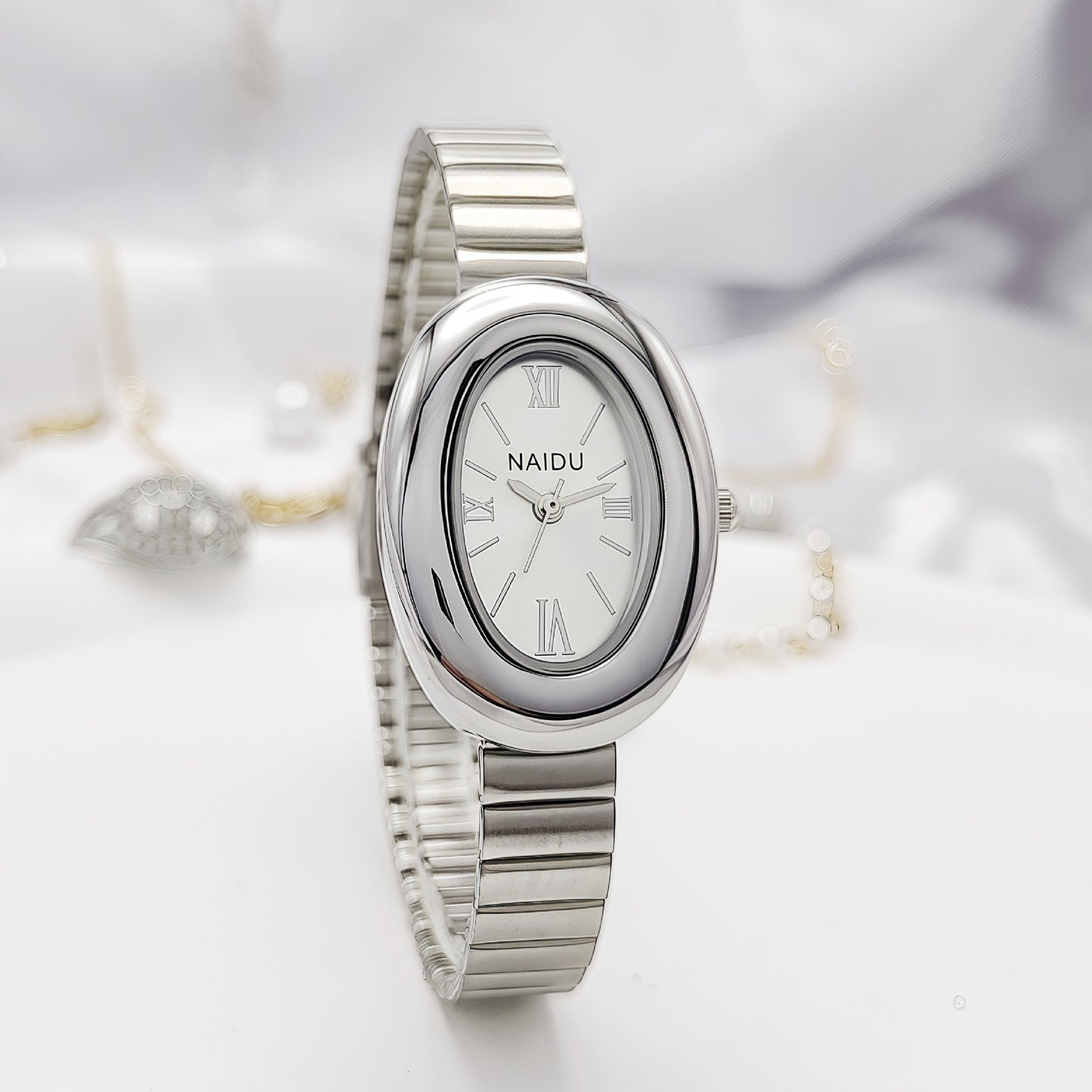 A refined oval dial wrapped in a smooth silver frame, designed to move effortlessly with your everyday moments. Minimal yet expressive, this watch brings quiet luxury to every wrist — perfect for daily wear or thoughtful gifting.