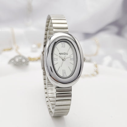 A refined oval dial wrapped in a smooth silver frame, designed to move effortlessly with your everyday moments. Minimal yet expressive, this watch brings quiet luxury to every wrist — perfect for daily wear or thoughtful gifting.