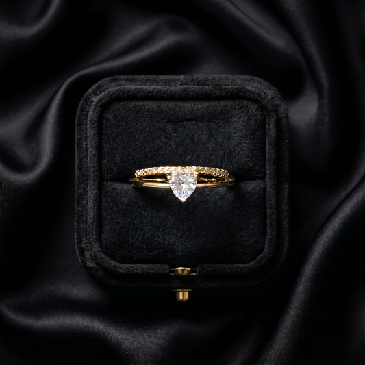 A tiny symbol of love wrapped in crystal sparkle, this ring captures the sweetness of a delicate heart glowing softly with light. Designed with a graceful silhouette and minimal elegance, it brings a romantic charm that feels subtle, timeless, and effortlessly beautiful.