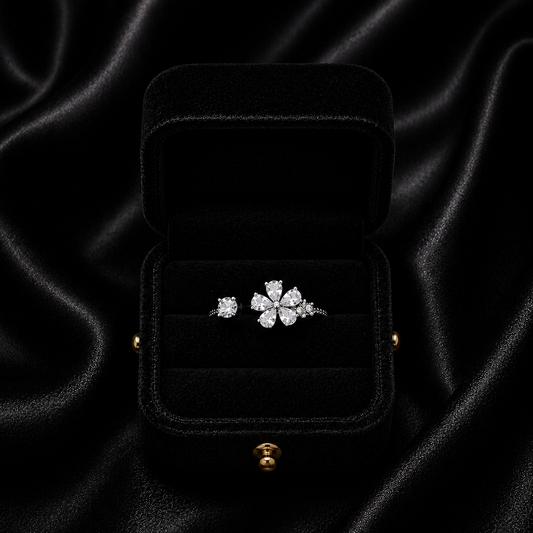 A graceful bloom carved in crystal sparkle, this ring captures the beauty of delicate petals touched by soft light. With its floral silhouette and refined shimmer, it brings an elegant charm that feels dreamy, feminine, and effortlessly timeless.
