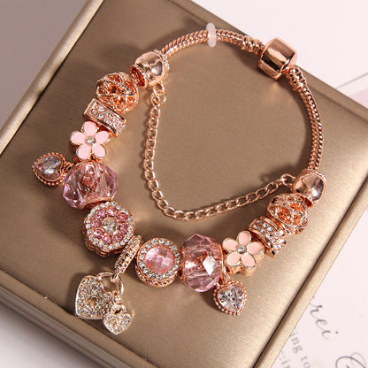 A romantic rose-gold or dreamy lilac,&nbsp;these bracelets are defined by a&nbsp;crystal center and a heart-and dream catcher-flower charm frame. The Dreamveil Charm Bracelets feel like a soft fairytale on your wrist—sweet sparkle, delicate details, and that “gifted with love” kind of glow.

