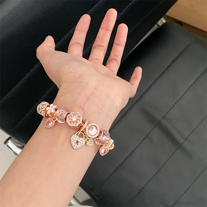 A romantic rose-gold or dreamy lilac,&nbsp;these bracelets are defined by a&nbsp;crystal center and a heart-and dream catcher-flower charm frame. The Dreamveil Charm Bracelets feel like a soft fairytale on your wrist—sweet sparkle, delicate details, and that “gifted with love” kind of glow.

