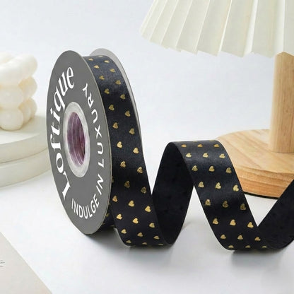 ES Ribbons are designed to add the perfect finishing touch to every gift. Crafted from soft fabric and detailed with elegant gold heart accents, these ribbons instantly elevate your packaging with warmth, love, and a premium feel.