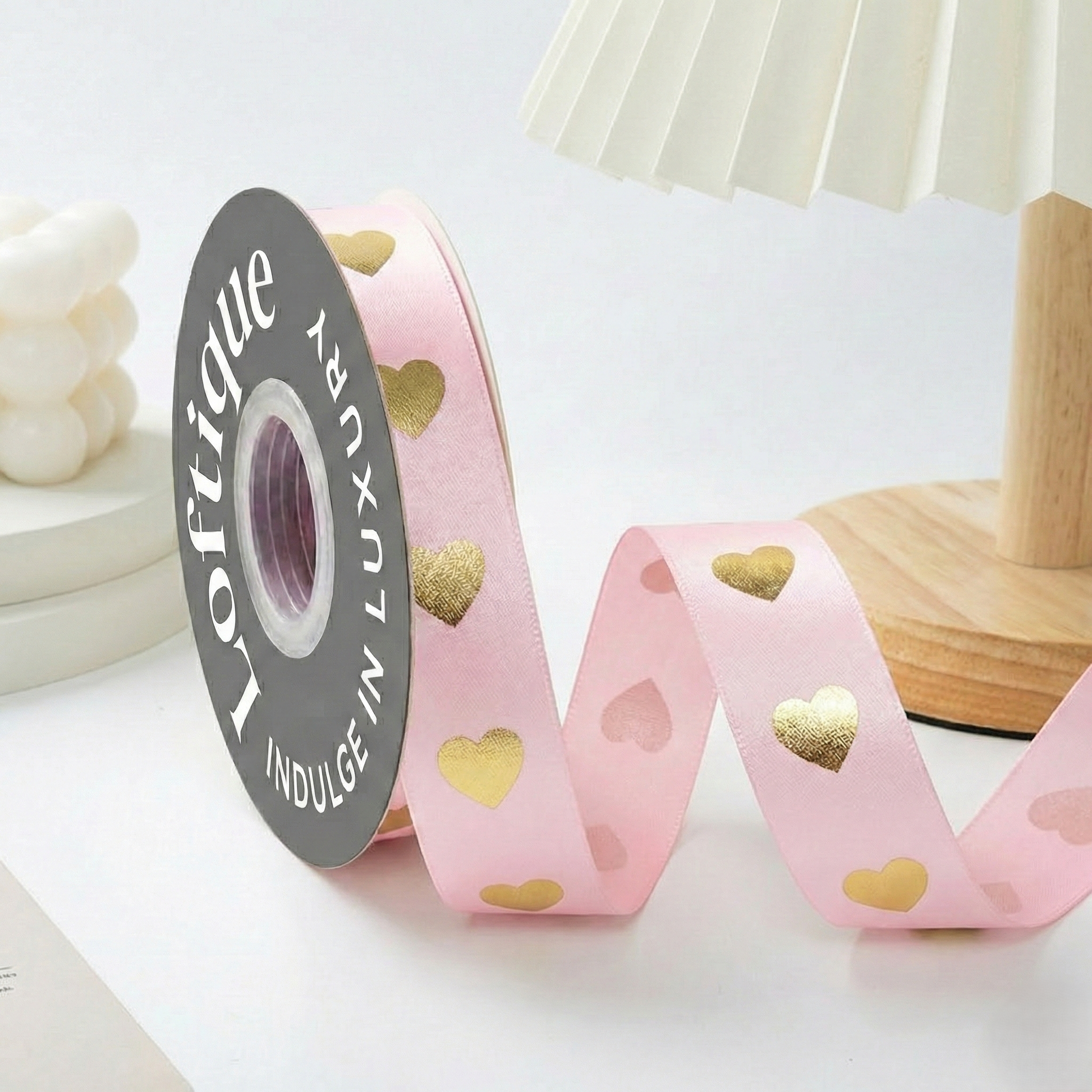 ES Ribbons are designed to add the perfect finishing touch to every gift. Crafted from soft fabric and detailed with elegant gold heart accents, these ribbons instantly elevate your packaging with warmth, love, and a premium feel.