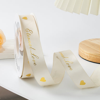 ES Ribbons are designed to add the perfect finishing touch to every gift. Crafted from soft fabric and detailed with elegant gold heart accents, these ribbons instantly elevate your packaging with warmth, love, and a premium feel.