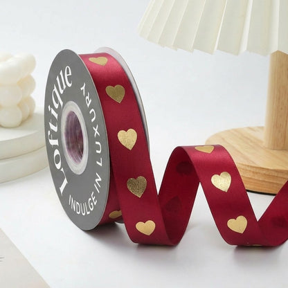 ES Ribbons are designed to add the perfect finishing touch to every gift. Crafted from soft fabric and detailed with elegant gold heart accents, these ribbons instantly elevate your packaging with warmth, love, and a premium feel.