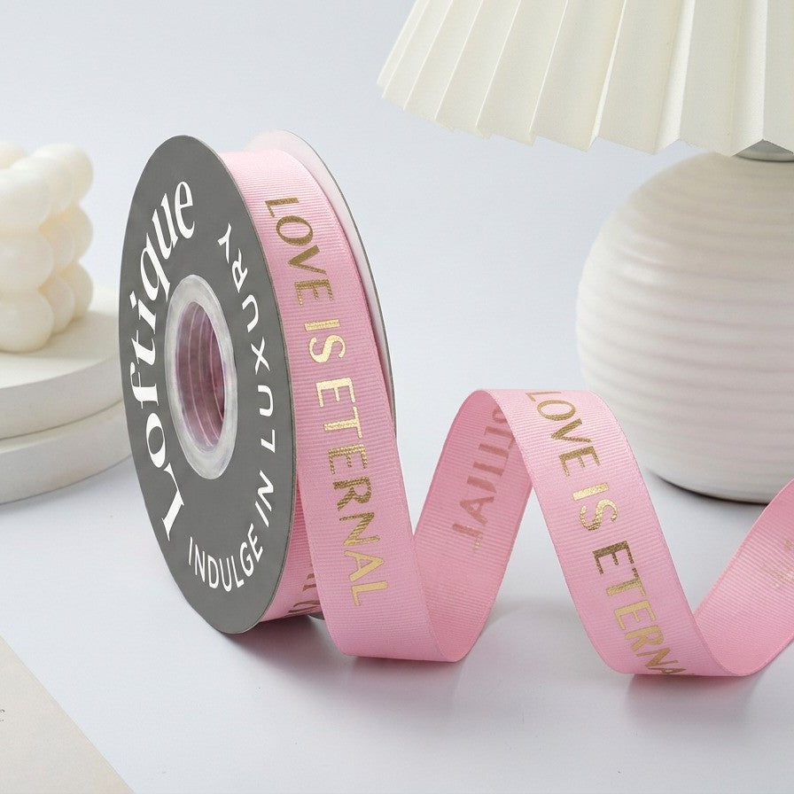 ES Ribbons are designed to add the perfect finishing touch to every gift. Crafted from soft fabric and detailed with elegant gold heart accents, these ribbons instantly elevate your packaging with warmth, love, and a premium feel.