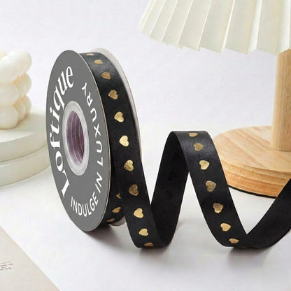 ES Ribbons are designed to add the perfect finishing touch to every gift. Crafted from soft fabric and detailed with elegant gold heart accents, these ribbons instantly elevate your packaging with warmth, love, and a premium feel.