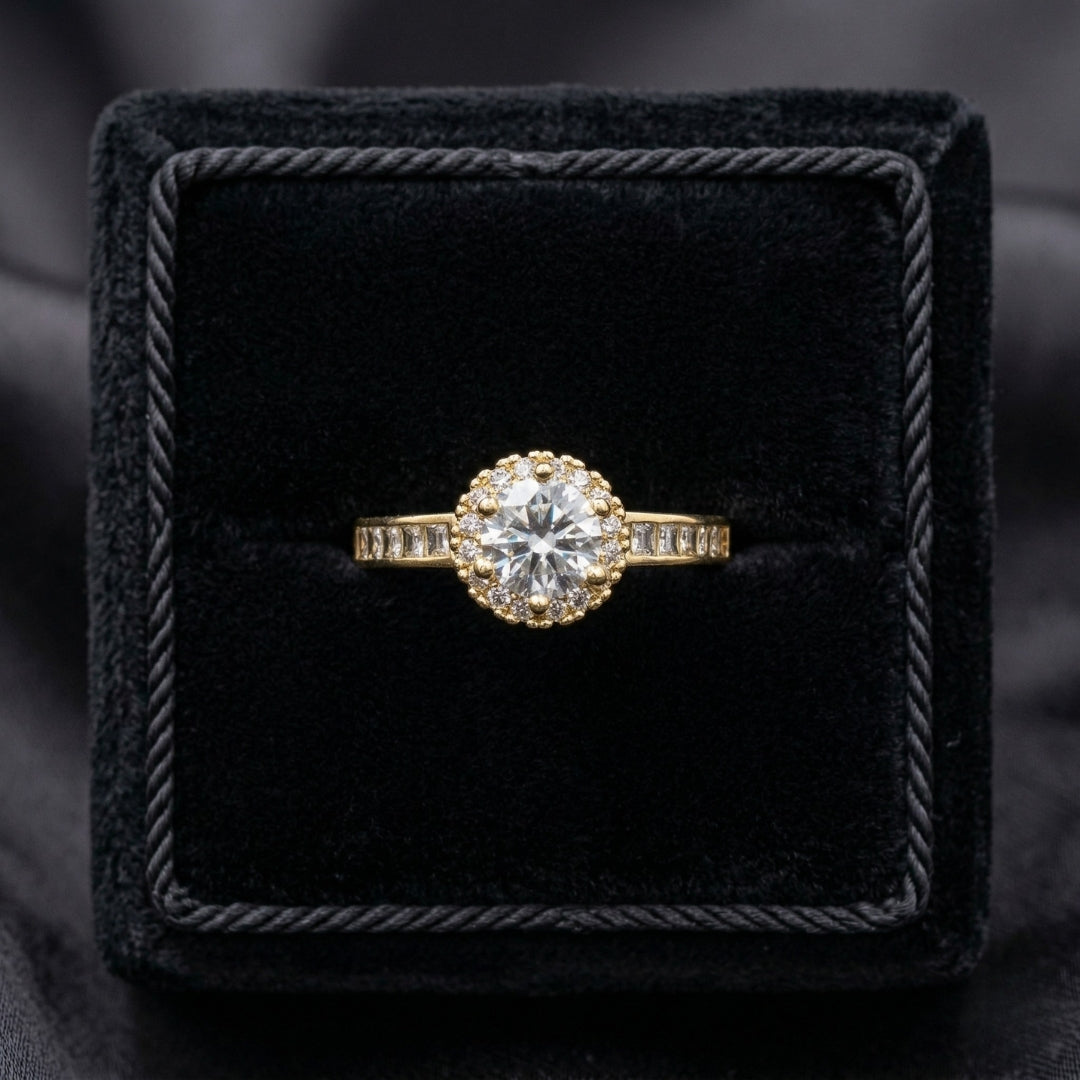 Elyra Spark Ring is a graceful blend of brilliance and simplicity, featuring a radiant zircon centerpiece surrounded by a fine halo of shimmering stones. Its sleek band, accented with subtle crystal detailing, enhances the overall sparkle while maintaining an elegant, minimal look. Designed to shine effortlessly, this ring adds a refined glow to both everyday moments and special occasions.