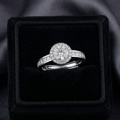Elyra Spark Ring is a graceful blend of brilliance and simplicity, featuring a radiant zircon centerpiece surrounded by a fine halo of shimmering stones. Its sleek band, accented with subtle crystal detailing, enhances the overall sparkle while maintaining an elegant, minimal look. Designed to shine effortlessly, this ring adds a refined glow to both everyday moments and special occasions.