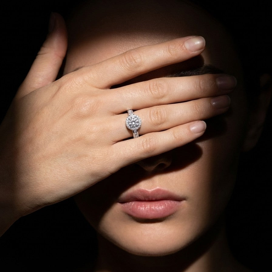 Elyra Spark Ring is a graceful blend of brilliance and simplicity, featuring a radiant zircon centerpiece surrounded by a fine halo of shimmering stones. Its sleek band, accented with subtle crystal detailing, enhances the overall sparkle while maintaining an elegant, minimal look. Designed to shine effortlessly, this ring adds a refined glow to both everyday moments and special occasions.