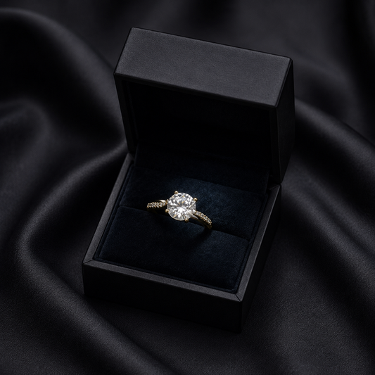 A soft shimmer wrapped in timeless elegance, this ring captures the beauty of light glowing through a delicate mist. Featuring a radiant crystal centerpiece with a refined minimal band, it creates a graceful sparkle that feels effortlessly luxurious and endlessly feminine.
