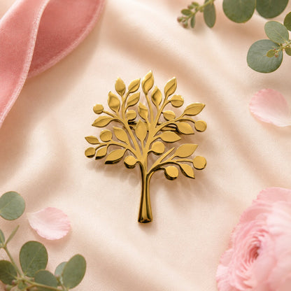Like a graceful ribbon tied within an enchanted golden garden, this elegant brooch captures a charming blend of coquette beauty, delicate sparkle, and timeless femininity. Featuring a sculpted bow silhouette covered in radiant crystal accents, it creates a refined statement that feels romantic, graceful, and effortlessly luxurious.