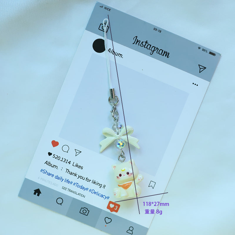 A tiny pop of cuteness designed to brighten your everyday essentials, this playful kitty charm brings a soft, joyful vibe wherever it goes. Finished with a delicate bow and subtle sparkle detail, it’s the perfect little accessory to add personality to your phone, bag, or keys.