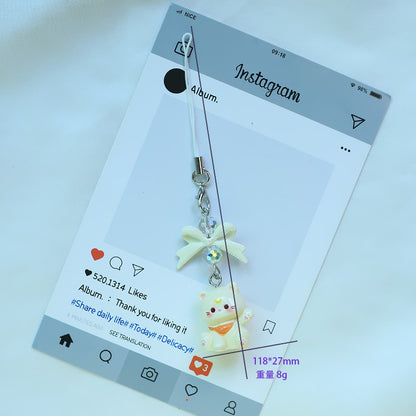 A tiny pop of cuteness designed to brighten your everyday essentials, this playful kitty charm brings a soft, joyful vibe wherever it goes. Finished with a delicate bow and subtle sparkle detail, it’s the perfect little accessory to add personality to your phone, bag, or keys.