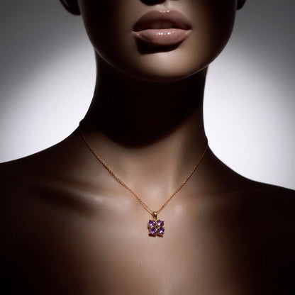 A delicate clover-inspired pendant adorned with soft lavender-toned crystals, this necklace carries a subtle sparkle that feels elegant, dreamy, and effortlessly charming. Its minimal silhouette and graceful shine make it a timeless everyday piece with a gentle romantic touch.