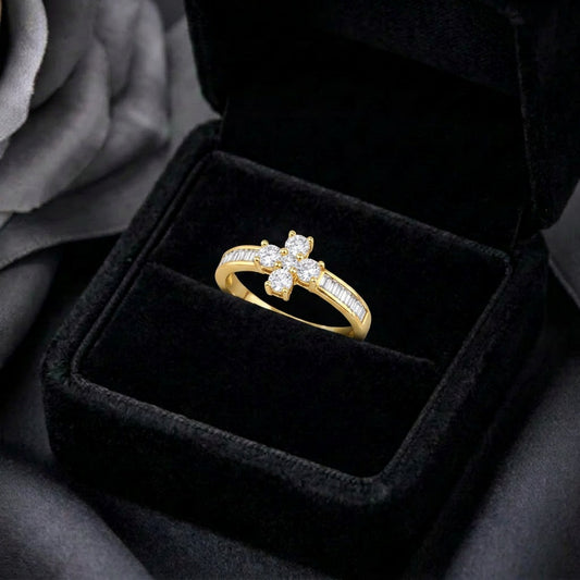 A graceful floral silhouette crowned with radiant sparkle, this ring blends delicate bloom details with refined brilliance. The crystal flower centerpiece paired with elegant baguette accents creates a timeless design that feels romantic, luxurious, and effortlessly charming.