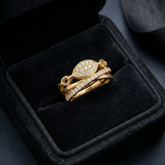 The Lustre Loop Ring features a beautifully intertwined design that blends modern elegance with delicate brilliance. Accented with shimmering zircon stones and a sleek looped structure, this ring creates a flowing silhouette that feels both refined and eye-catching. The unique loop design symbolizes continuity and elegance. Available exclusively at Loftique your One Stop Gifting Solution.