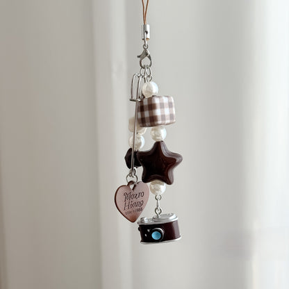 A little story you can carry everywhere — warm, nostalgic, and softly detailed. The Mocha Diary Charm blends cozy café tones with playful elements, creating a charming piece that feels both aesthetic and personal, like a memory captured in miniature.