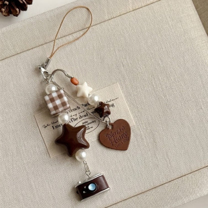 A little story you can carry everywhere — warm, nostalgic, and softly detailed. The Mocha Diary Charm blends cozy café tones with playful elements, creating a charming piece that feels both aesthetic and personal, like a memory captured in miniature.