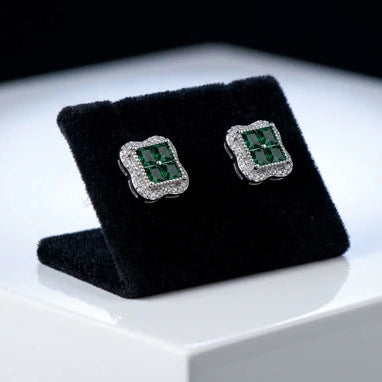 A quiet sparkle with a bold presence, the Nova Studs capture the brilliance of a star in a refined, minimalist design. Featuring a radiant square crystal centerpiece framed by delicate shimmering accents, these studs reflect light beautifully from every angle. Elegant yet versatile, they bring a graceful glow to both everyday looks and special moments.