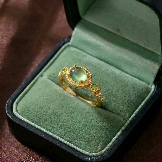 A regal touch inspired by laurel leaves and timeless elegance, this ring captures the beauty of a crowned silhouette wrapped around a luminous center stone. With its delicate olive-inspired details and refined sparkle, it creates a graceful charm that feels vintage, royal, and effortlessly sophisticated.