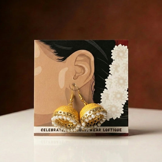 Graceful colors, intricate enamel art, and timeless heritage Pearl Garden Jhumka reflects the beauty of traditional Mughal craftsmanship. Inspired by blooming garden patterns and royal jewelry designs, these vibrant jhumkas add a festive charm to any look.
