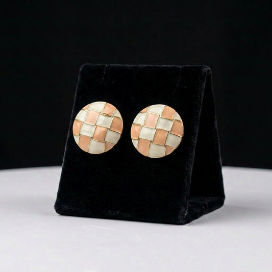 A charming blend of soft blush tones and woven elegance, these earrings feature a delicate checker mosaic design inspired by petals arranged in harmony. The warm peach and ivory palette creates a graceful statement that feels vintage, feminine, and effortlessly chic.